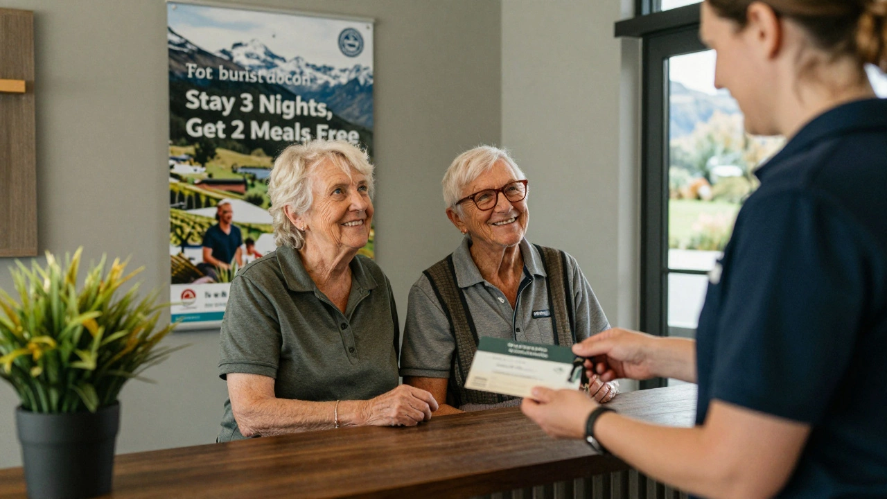Couple receiving a spa voucher and upgraded room keys at a boutique hotel front desk.